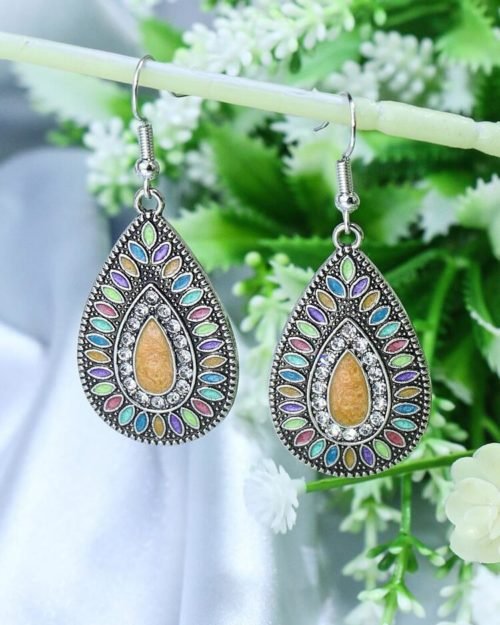 Aretes Lirio con brillantitos.